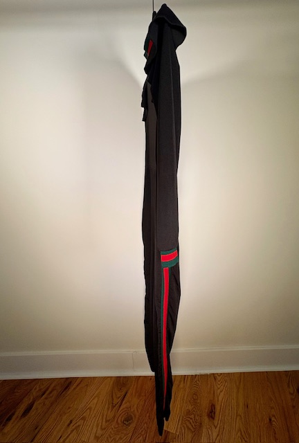 Black stripe jumpsuit side view